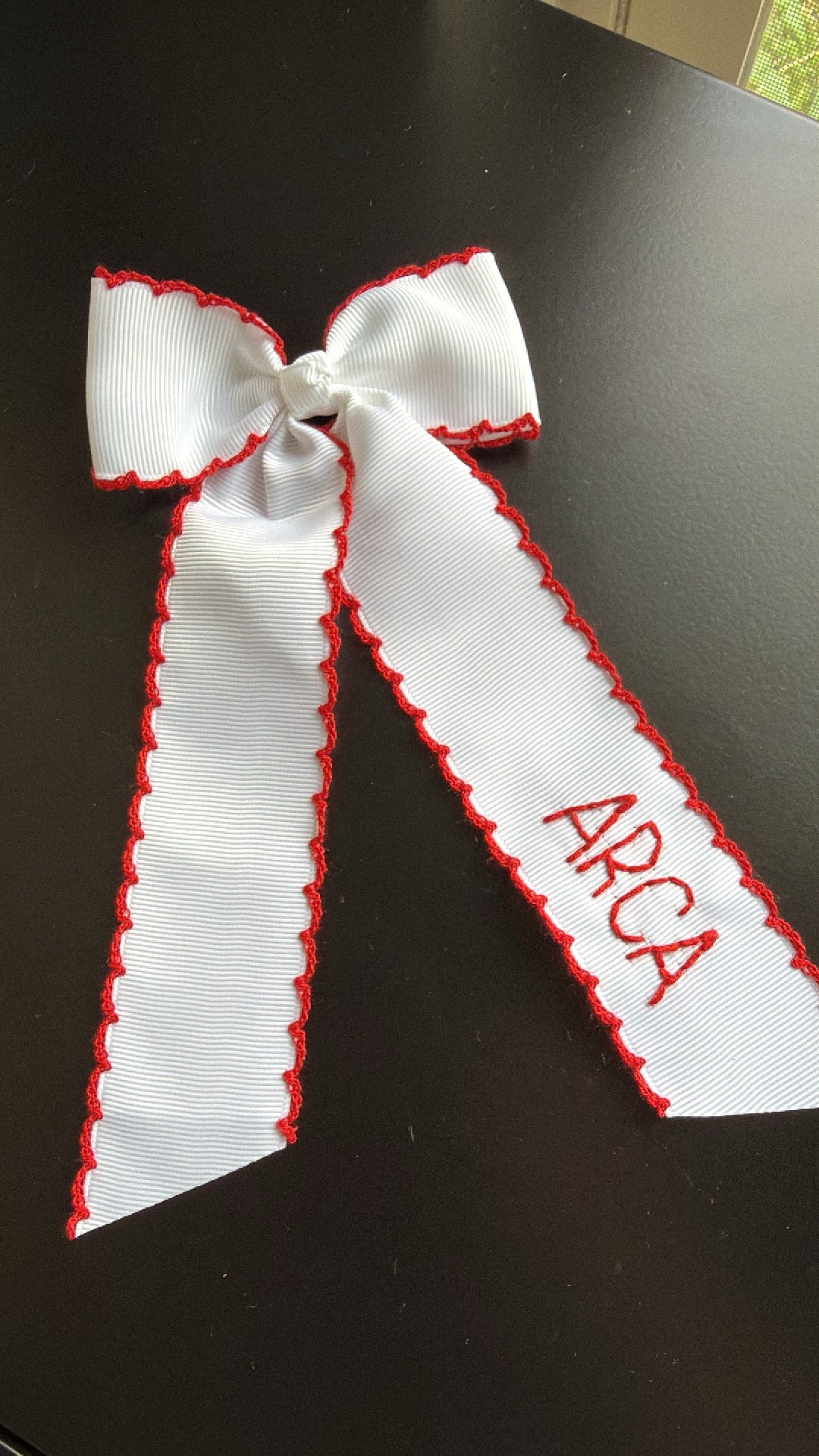 ARCA White and Red Bow