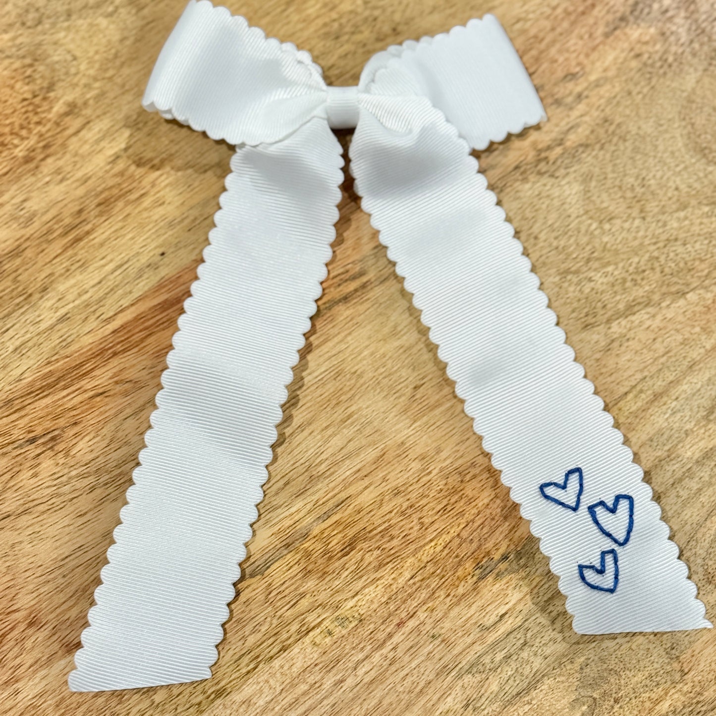 White Longtail with Navy Hearts